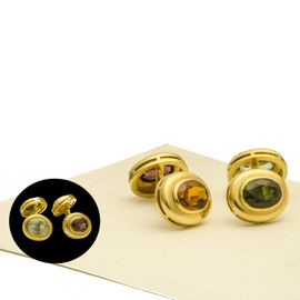 Manschettenknöpfe in 750 Gelbgold mit 4 verschiedenen Steinen