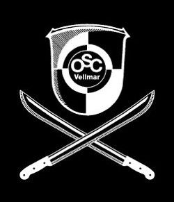 Wappen der Arnis-Kali-Gruppe Wappen des OSC Vellmar e.V. mit zwei gekreutzten Macheten