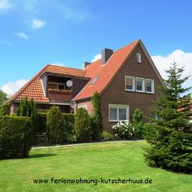 Ferienwohnung Kutscherhuus mit einer Gartensauna in Ostfriesland