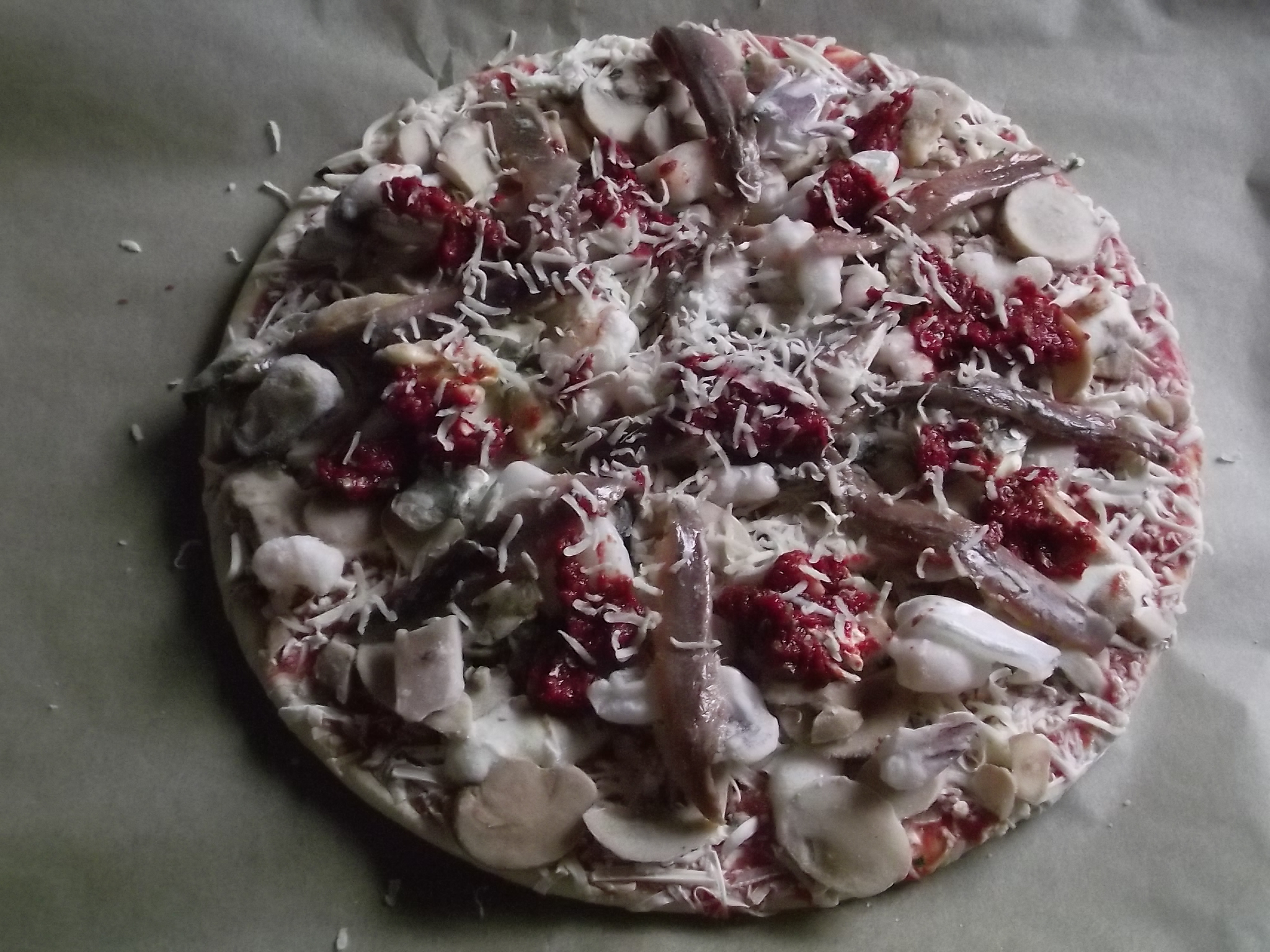 Pimp my Pizza vor dem Backen - aus Funghi wird Frutti Mare