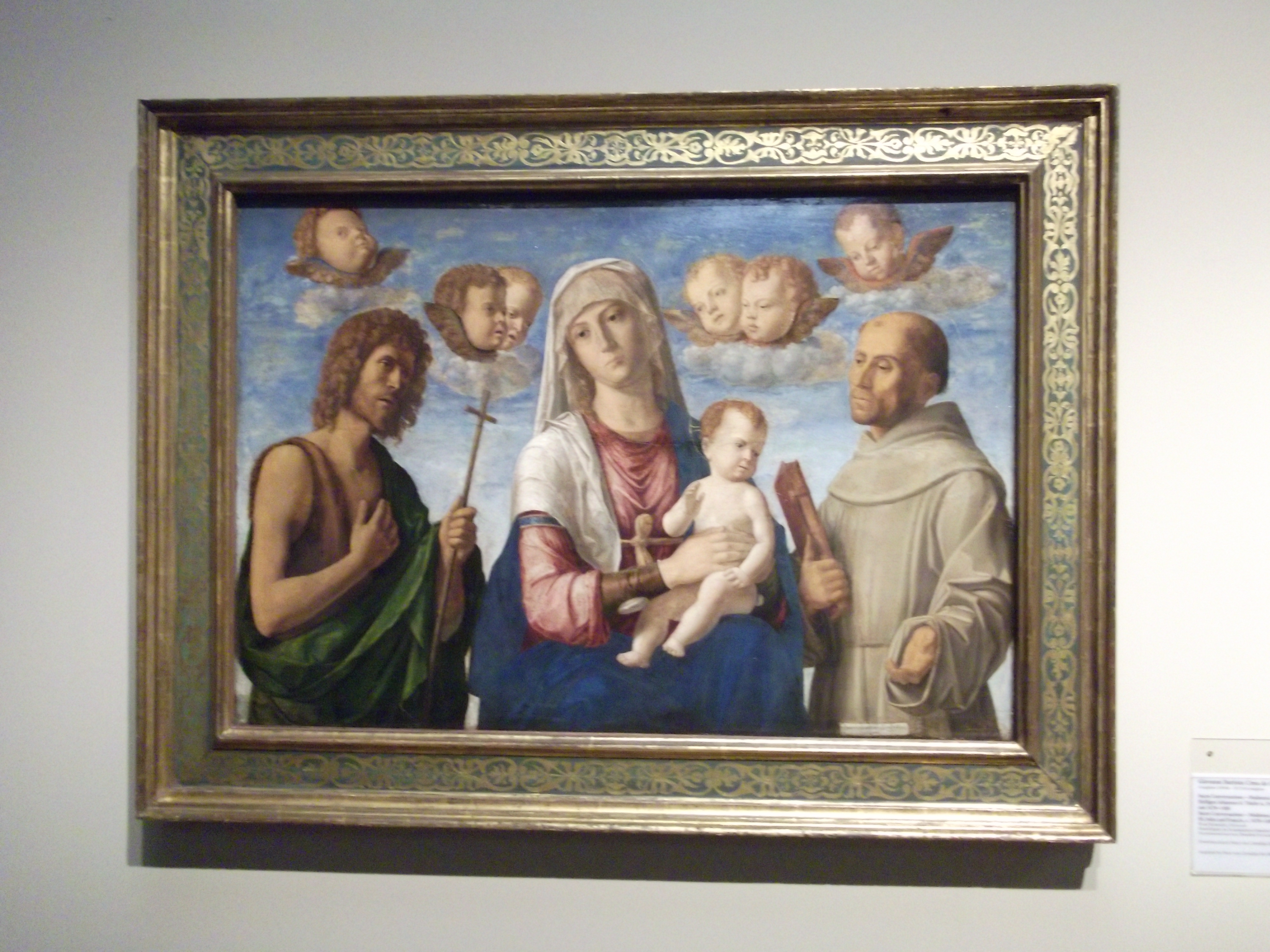 italienische Renaissancearbeit: von Giovanni Batista Cima gen. da Conegliano (um 1459-1518) Madonna mit Christusknaben und den heiligen Johannes dem T&auml;ufer und Frasnziskus