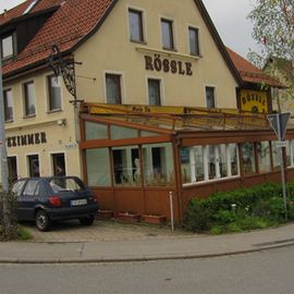 Der Wintergarten an der Eingangsseite.