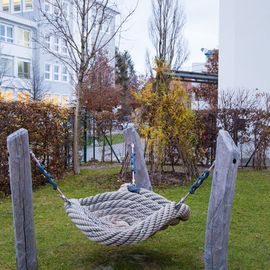 Minihaus München Tölzer Straße Garten Krippe