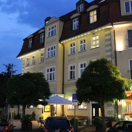 Das Hotel An der Persiluhr in Lünen an einem gemütlichen Sommerabend