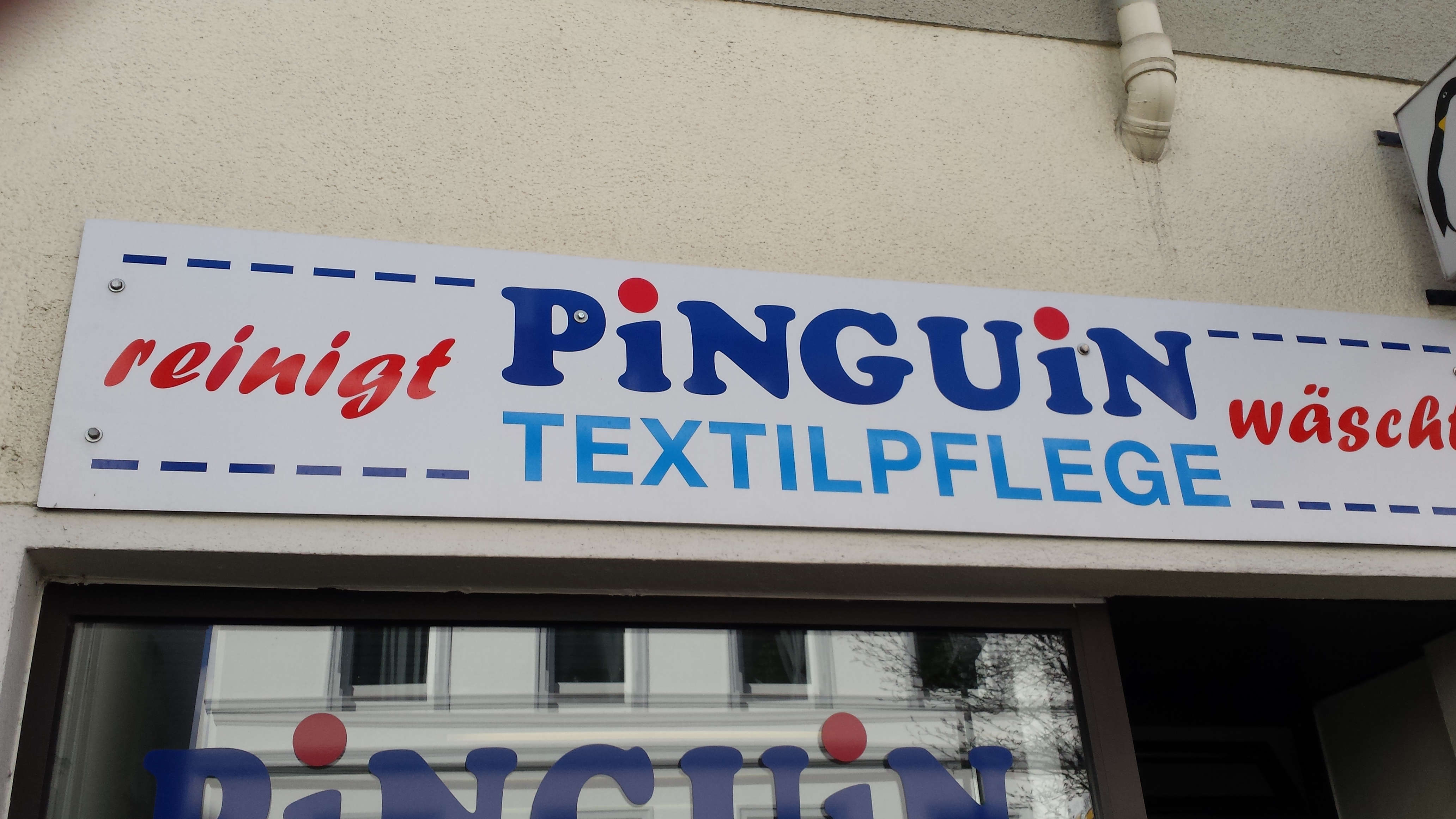 Bild 1 Pinguin - Textilpflege in Osnabrück