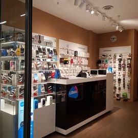 Phonestop - Smartphone u. Handy Reparatur in München