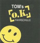 Logo von Tom's O.K. Fahrschule in Erlangen